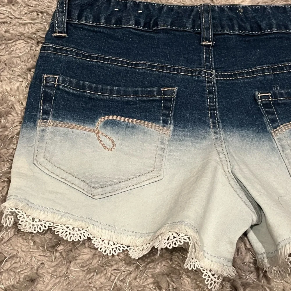 JUSTICE Girls Denim Shorts-  Size 10 These are cute and fashionable.